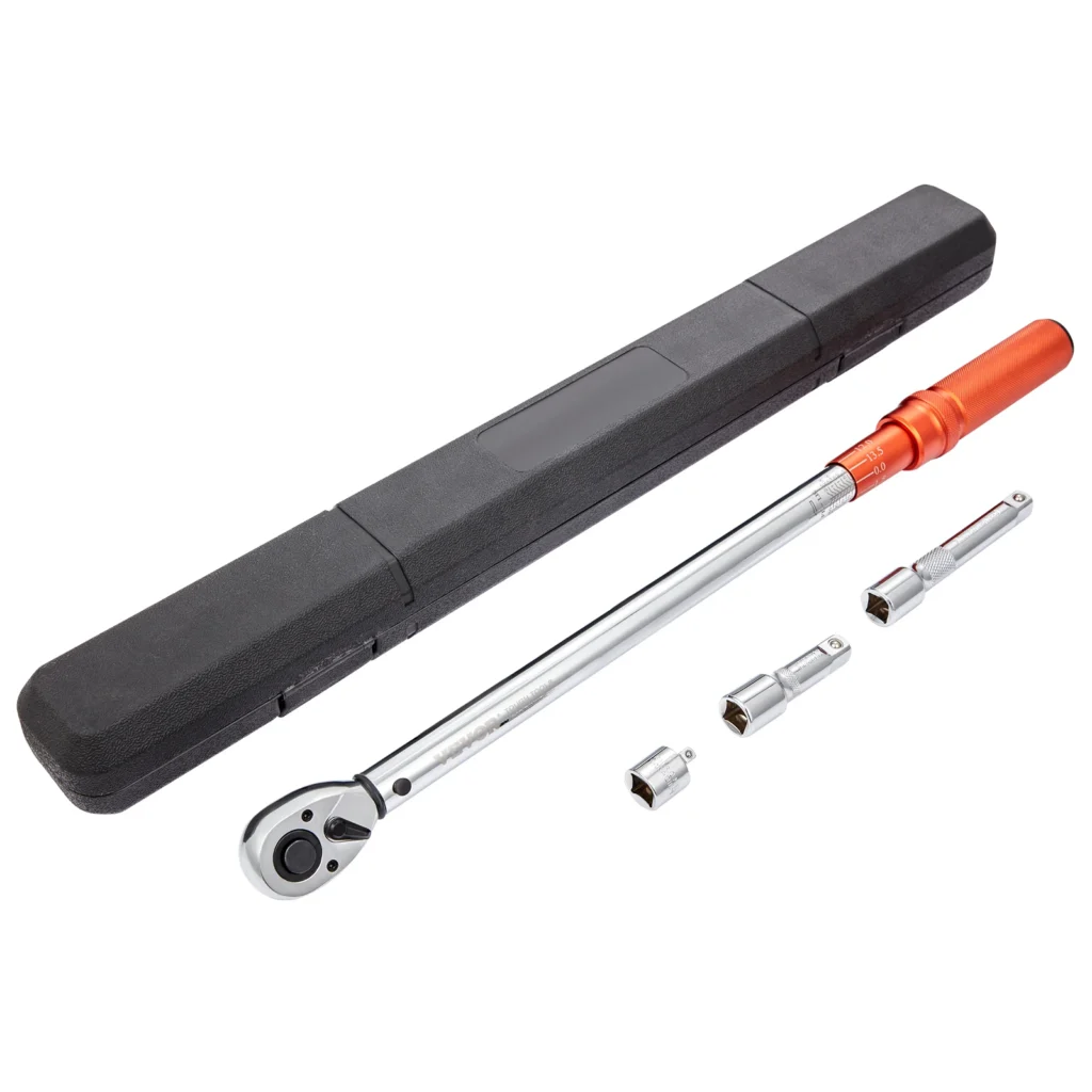 Torque wrench with 72-tooth ratchet head and metal handle on a workbench