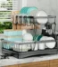 Large 2 tier — black metal 2-tier dish drying rack loaded with plates, bowls and mugs on a kitchen countertop